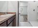 Bathroom with a single vanity and a stand-up shower through the door at 32713 Brooks Hawk Ln, Wesley Chapel, FL 33543