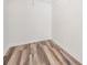 Walk in closet with new floors, clean paint, new baseboards and wire shelving at 32713 Brooks Hawk Ln, Wesley Chapel, FL 33543