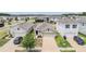 Charming single-Gathering home showcasing a well-maintained lawn and inviting two-car garage at 32713 Brooks Hawk Ln, Wesley Chapel, FL 33543