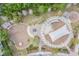 Aerial view of a well-designed community playground featuring various play structures at 32713 Brooks Hawk Ln, Wesley Chapel, FL 33543
