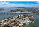 Charming waterfront home in a beautiful neighborhood with easy bridge access, seen from above at 3555 Belle Vista E Dr, St Pete Beach, FL 33706
