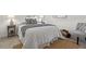 Cozy bedroom with a comfortable bed, stylish chair, and soft lighting, creating a relaxing retreat at 3555 Belle Vista E Dr, St Pete Beach, FL 33706