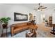 Spacious living room with a contemporary design, comfortable leather sofa and lots of light at 3558 65Th Avenue E Cir, Sarasota, FL 34243