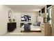 Modern bedroom featuring contemporary decor, comfortable bed, and ample natural light at 36017 Joseph Blake St, Zephyrhills, FL 33541