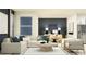 Spacious and elegant living room with comfortable seating and stylish decor at 36017 Joseph Blake St, Zephyrhills, FL 33541