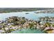 Expansive view showcasing waterfront home with private dock and scenic water access in a beautiful neighborhood setting at 425 12Th Ave, Indian Rocks Beach, FL 33785
