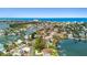 Gorgeous aerial view of waterfront homes and community with quick access to the open ocean at 425 12Th Ave, Indian Rocks Beach, FL 33785