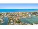 Desirable waterfront property features private dock, easy access to the ocean, and stunning panoramic views at 425 12Th Ave, Indian Rocks Beach, FL 33785