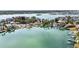 Desirable waterfront community featuring private docks and access to open water, surrounded by lush landscaping at 425 12Th Ave, Indian Rocks Beach, FL 33785