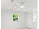 Bedroom featuring a window with natural sunlight, large closet, and ceiling fan at 425 12Th Ave, Indian Rocks Beach, FL 33785