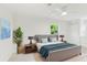 Cozy bedroom with neutral walls, ceiling fan, and a decorative plant at 425 12Th Ave, Indian Rocks Beach, FL 33785