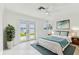 Inviting bedroom features a calming water view and serene décor at 425 12Th Ave, Indian Rocks Beach, FL 33785