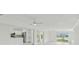 Open-concept living area with a modern kitchen, sleek appliances, and bright, open living space at 425 12Th Ave, Indian Rocks Beach, FL 33785