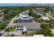 Aerial shot of a neighborhood with lush landscaping and glimpses of Tampa Bay in the distance at 429 Erie Ave, Tampa, FL 33606