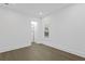 Bright bedroom features hardwood floors, closet, and a window with natural light at 429 Erie Ave, Tampa, FL 33606