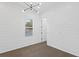 Bright bedroom with hardwood floors and views of the pool at 429 Erie Ave, Tampa, FL 33606