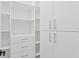 Walk-in closet offers custom shelving and ample storage space at 429 Erie Ave, Tampa, FL 33606
