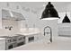 Modern kitchen features stainless steel appliances, custom white cabinets, and a stylish backsplash at 429 Erie Ave, Tampa, FL 33606