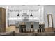 Bright kitchen boasts a central island, marble backsplash, and high-end stainless steel appliances at 429 Erie Ave, Tampa, FL 33606