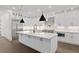 Well-appointed kitchen with island, stainless appliances, and ample cabinet space at 429 Erie Ave, Tampa, FL 33606