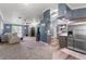 Open-concept living space with connecting kitchen, living and dining areas, ideal for modern living at 4410 Foxboro Dr, New Port Richey, FL 34653