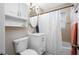 Full bath features a vanity, toilet, and tub-shower combo at 4721 W Lawn Ave, Tampa, FL 33611