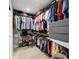 Spacious walk-in closet with custom shelving and ample storage at 4721 W Lawn Ave, Tampa, FL 33611