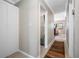 Hallway leading to living area and bedroom with closet at 4721 W Lawn Ave, Tampa, FL 33611