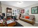 Bright and airy office with plantation shutters and wood-look floors at 4721 W Lawn Ave, Tampa, FL 33611