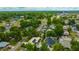 An aerial view of a residential neighborhood with tree-lined streets and various home styles at 509 N Walker St, Plant City, FL 33563