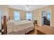 Bedroom featuring hardwood floors, ceiling fan, and windows with natural light at 509 N Walker St, Plant City, FL 33563