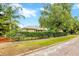 Well-maintained house with lush green lawn and mature landscaping. Brick road provides curb appeal at 509 N Walker St, Plant City, FL 33563