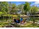 Backyard seating area next to canal, great for entertaining and cookouts at 5421 Gay St, Weeki Wachee, FL 34607