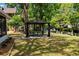 Backyard gazebo overlooking the canal, creating a serene spot for outdoor dining and relaxation at 5421 Gay St, Weeki Wachee, FL 34607