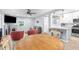 Spacious open-concept featuring living room, dining space, and kitchen, perfect for entertaining and comfortable living at 5421 Gay St, Weeki Wachee, FL 34607