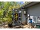 Outdoor shower adorned with nautical decor and a privacy screen for a charming coastal touch at 5421 Gay St, Weeki Wachee, FL 34607