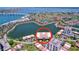 Beautiful waterfront condos with terracotta roofing and lush landscaping overlooking the calm waters at 6290 Bahia Del Mar Cir # 12, St Petersburg, FL 33715