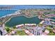 Stunning aerial view of waterfront community boasting lush landscaping, boat docks, and picturesque lake views at 6290 Bahia Del Mar Cir # 12, St Petersburg, FL 33715