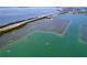 Breathtaking aerial view featuring boats, bridges, and the tranquil waters offering a scenic and serene backdrop at 6290 Bahia Del Mar Cir # 12, St Petersburg, FL 33715