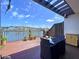 Outdoor patio with water view provides the perfect space for relaxation and al fresco dining at 6290 Bahia Del Mar Cir # 12, St Petersburg, FL 33715