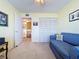 Well-lit bedroom with a closet for storage, and a doorway to another room at 6290 Bahia Del Mar Cir # 12, St Petersburg, FL 33715