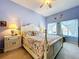 Tranquil bedroom with water views, comfy bed, and bedside tables at 6290 Bahia Del Mar Cir # 12, St Petersburg, FL 33715