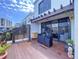 Outdoor deck features a table and chairs, perfect for entertaining or relaxing with a water view at 6290 Bahia Del Mar Cir # 12, St Petersburg, FL 33715