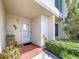 Charming condo entrance with brick accents, well-maintained landscaping, and a welcoming ambiance at 6290 Bahia Del Mar Cir # 12, St Petersburg, FL 33715