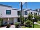 Inviting condo featuring well-manicured landscaping, a charming entrance, and an inviting sense of community at 6290 Bahia Del Mar Cir # 12, St Petersburg, FL 33715