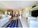 Spacious living room with tile flooring, comfortable seating, and seamless flow to other areas at 6290 Bahia Del Mar Cir # 12, St Petersburg, FL 33715