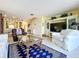 Bright living room offers generous seating and elegant decor, perfect for entertaining guests at 6290 Bahia Del Mar Cir # 12, St Petersburg, FL 33715