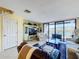 Spacious living room with comfortable seating and picturesque views of the waterfront at 6290 Bahia Del Mar Cir # 12, St Petersburg, FL 33715