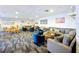 Spacious community lounge with multiple seating arrangements and bright natural light at 6290 Bahia Del Mar Cir # 12, St Petersburg, FL 33715