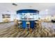 Circular bar area with seating surrounded by lounge areas perfect for socializing and relaxation at 6290 Bahia Del Mar Cir # 12, St Petersburg, FL 33715